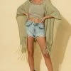 Wanderlust By Abby Fringe Knit Poncho Top